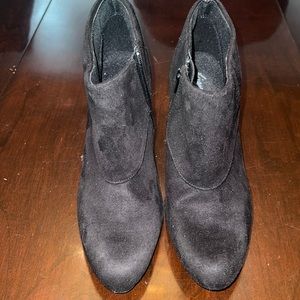 Broken zipper black booties